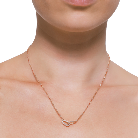 Roségold Collier mit funkelndem Anhänger im Geo-Design